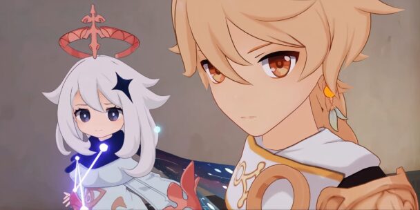 A cute anime baby with a smiling face and a pacifier taped to its head.