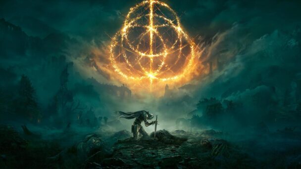 A man enjoying a bonfire outdoors at night, surrounded by nature.